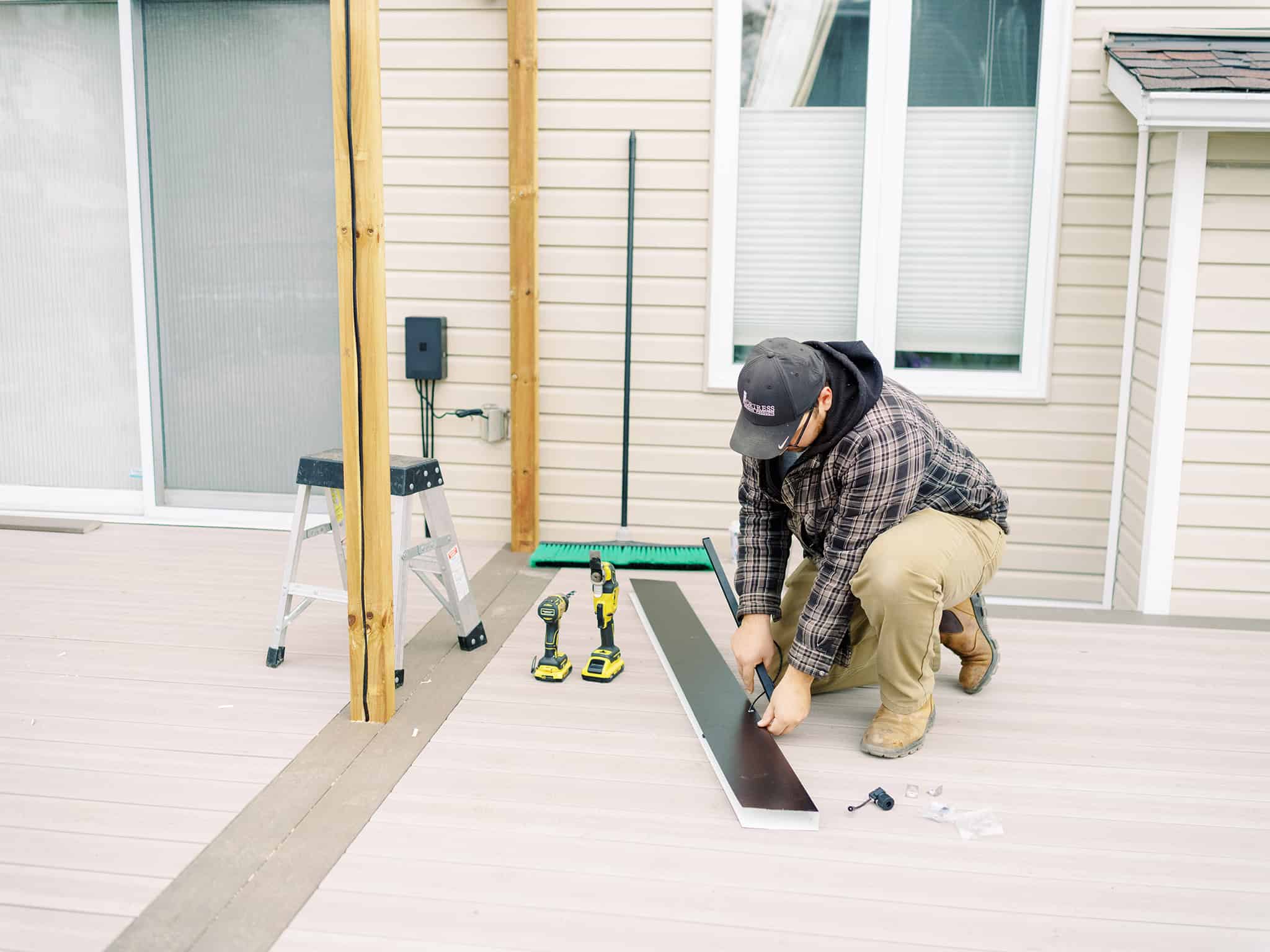 Ottawa deck builder completing detail work on a residential deck