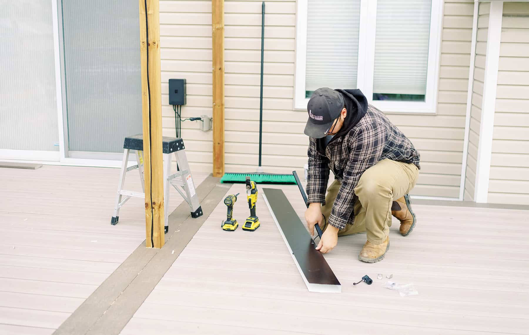 Ottawa Deck Builders team member installing deck details