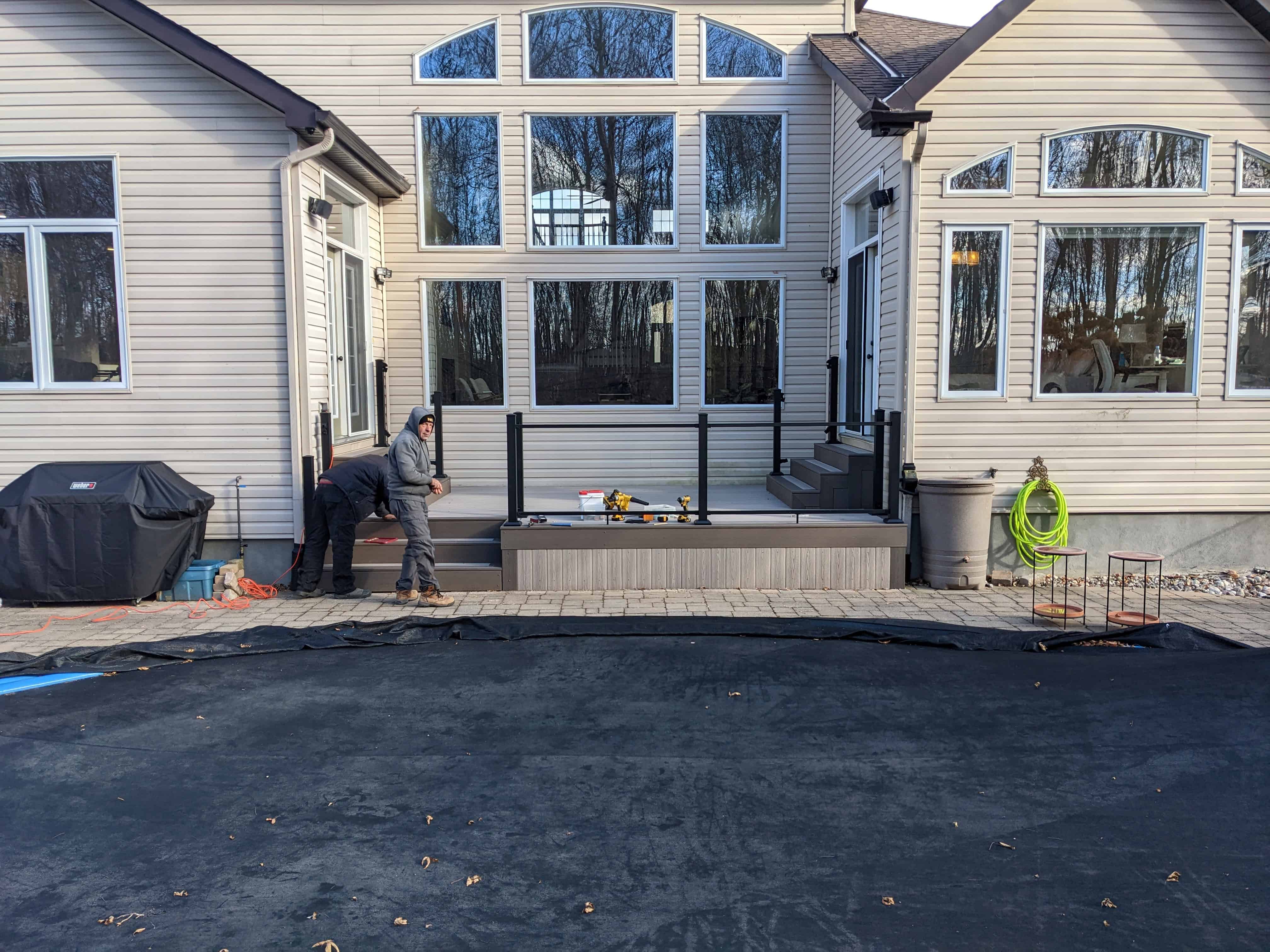 Cabana Latte poolside deck with glass railing