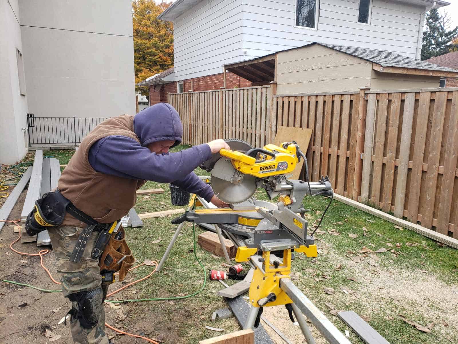Ottawa deck builder cutting boards on a residential deck project