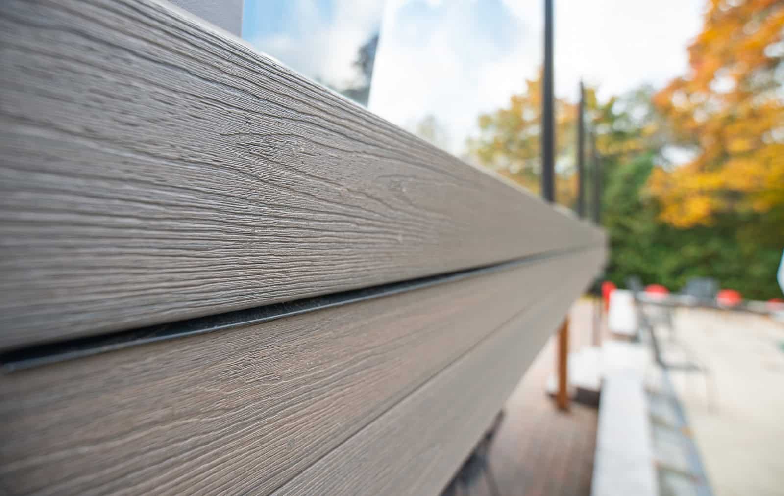 Close-up detail of premium deck board finish and railing